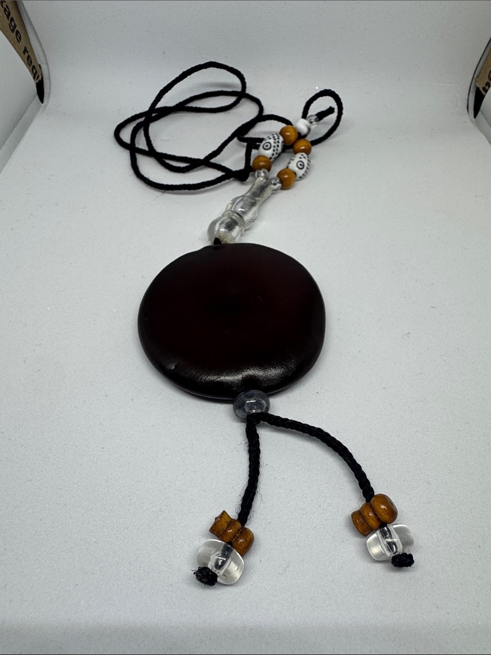 Round Dark Brown Pendant Necklace with Bead Accents